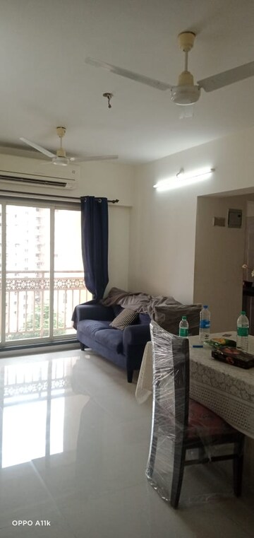 Living Room in 1 BHK Apartment at Rosa Royale, Ghodbunder Road – for Rent