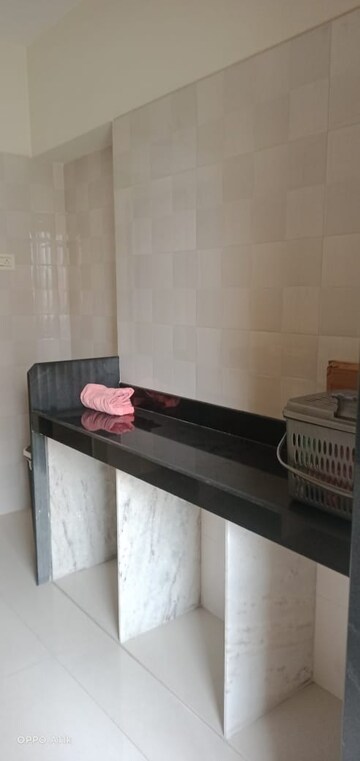 Kitchen in 1 BHK Apartment at Rosa Royale, Ghodbunder Road – for Rent