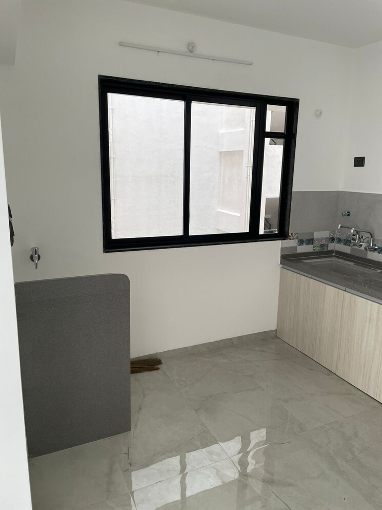 Kitchen, unique-youtopia 2 Bedroom 765 Sq.Ft. Apartment In Kharadi Pune 8994695