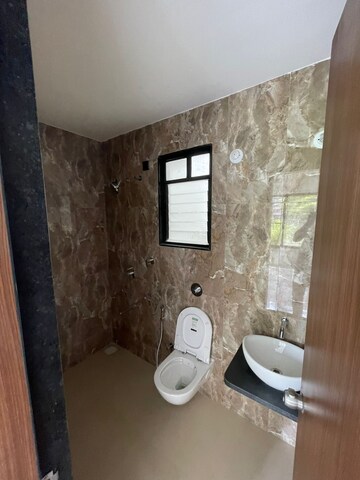 Bathroom in 2 BHK Apartment at Unique Youtopia, Kharadi – for Rent