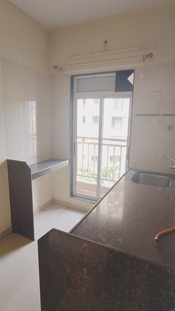 Kitchen in 1 BHK Apartment at Laabh Shubh Sanket Complex, Ghodbunder Road – for Rent