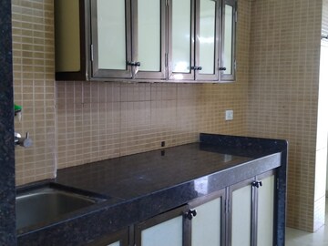 Kitchen in 2 BHK Apartment at Kamanwala Manavsthal, Malad West – for Rent