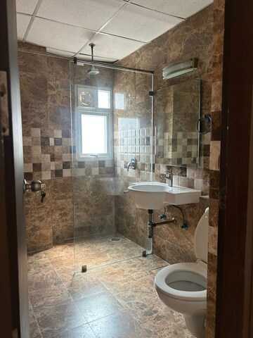 Bathroom in 4 BHK Apartment at Sunshine Helios, Sector 78 – for Rent