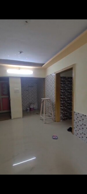 Living Room in 2 BHK Apartment at Ramdev Park, Mira Road – for Sale