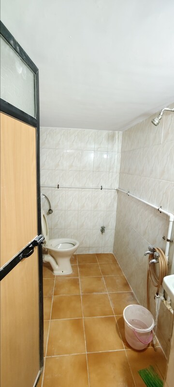 Bathroom in 1 BHK Apartment at Krishna Greenland Park Vastu Federation, Ghodbunder Road – for Rent