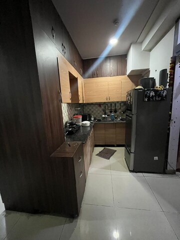 Kitchen in 2 BHK Apartment at Gaur City 2 - 12th Avenue, Sector 16c Greater Noida – for Rent