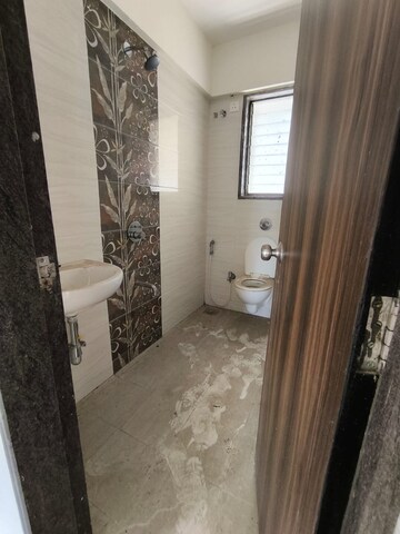 Bathroom in 1 BHK Apartment at Abrol Avirahi Heights, Malad West – for Sale