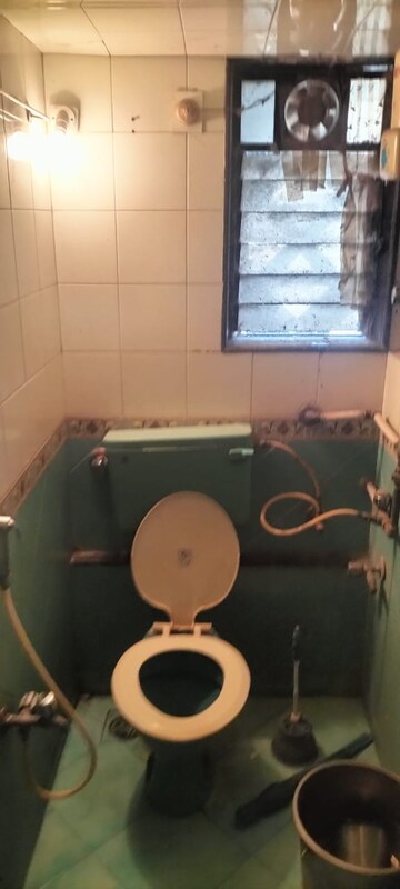 Bathroom in 1.5 BHK Apartment at Eff Jumbo Darshan CHS, Andheri East – for Rent