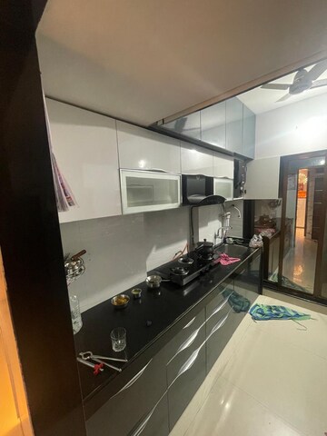Kitchen in 2 BHK Apartment at Shanti Seven, Mira Road – for Sale
