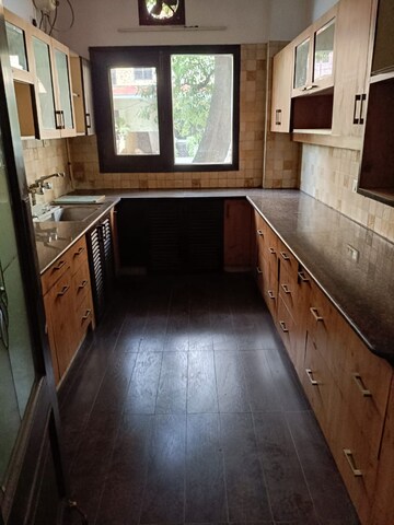 Kitchen in  Office Space at Boutique Residential Apartments C-253, Defence Colony – for Rent