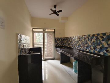 Living Room in 1 BHK Apartment at Cosmos Orchid, Ghodbunder Road – for Rent