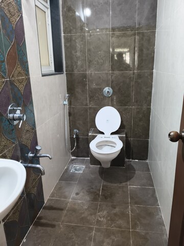Bathroom in 1 BHK Apartment at Cosmos Orchid, Ghodbunder Road – for Rent