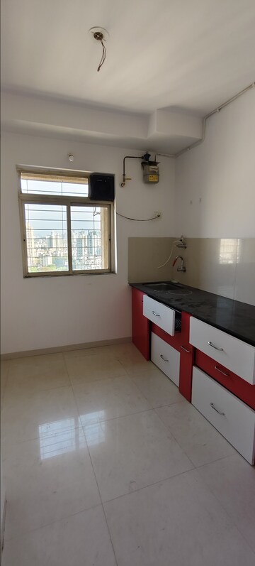 Kitchen in 1 BHK Apartment at Puranik City, Kasarvadavali – for Rent