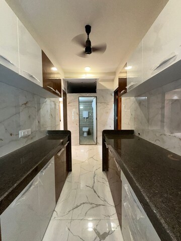 Kitchen in 1 BHK Apartment at Shellproof Gladiolus Tower, Vasai East – for Sale