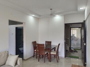 Living Room in 1 BHK Apartment at RNA Platinum City, Vasai East – for Sale