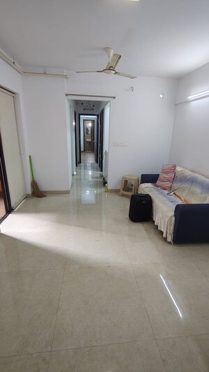 Living Room in 2 BHK Apartment at Lodha Palava Downtown Dombivli East, Dombivli East – for Sale