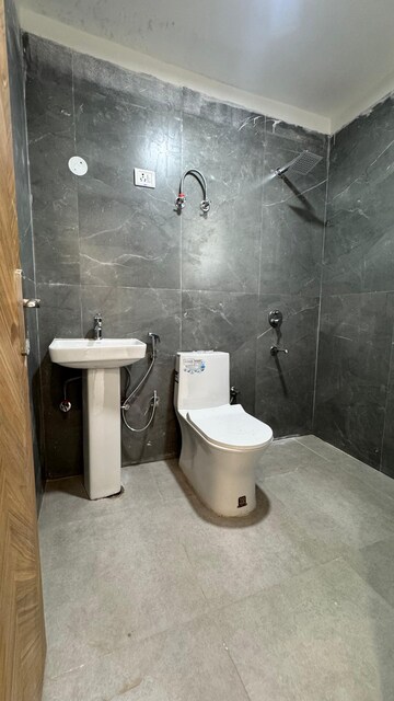Bathroom in 1.5 BHK Builder Floor at Risland Sky Mansion, Chattarpur – for Rent