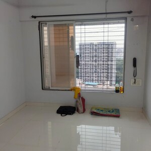 Living Room in 1 BHK Apartment at Hirani Shree Ganesh Tower, Kurla – for Sale