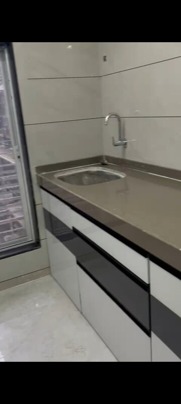 Kitchen in 1 BHK Apartment at Accord Bindra One, Andheri East – for Rent