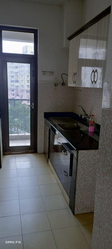 Kitchen in 3 BHK Apartment at Alpine Society, Omega Iv Greater Noida – for Rent