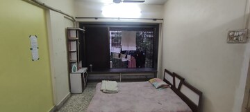 Living Room in 1 BHK Apartment at Tranquility Apartments, Andheri West – for Sale