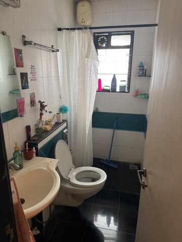 Bathroom in 2 BHK Apartment at Evershine Greens, Andheri West – for Rent