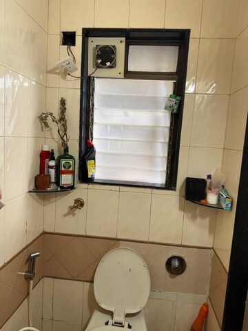 Bathroom in 2 BHK Apartment at Evershine Greens, Andheri West – for Rent