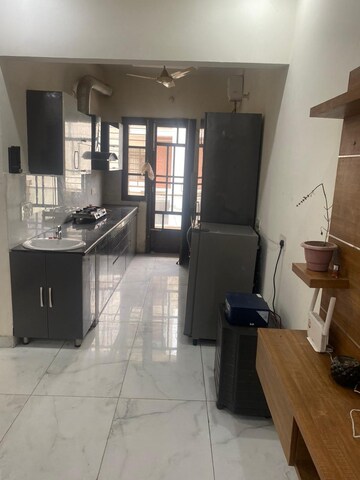 Kitchen in 3 BHK Builder Floor at CRD Golden Castle, Patiala Road – for Rent