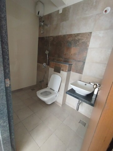 Bathroom in 2 BHK Apartment at Dev Leo Tower, Oshiwara – for Rent