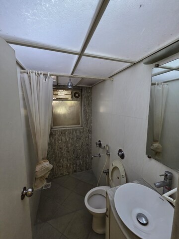 Bathroom in 2 BHK Apartment at Krishnaj Gift, Khar West – for Rent