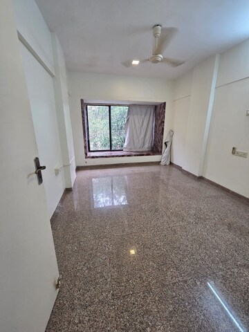 Room in 2 BHK Apartment at Krishnaj Gift, Khar West – for Rent