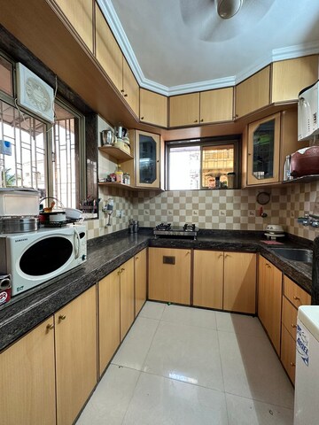 Kitchen in 2 BHK Apartment at Vasu Bhavan, Khar West – for Rent