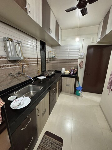 Kitchen in 1 BHK Apartment at Wadgaon Sheri – for Rent