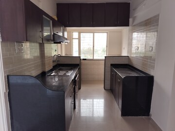 Kitchen in 2 BHK Apartment at Dwarka Suncrest Phase 3, Pimple Saudagar – for Rent
