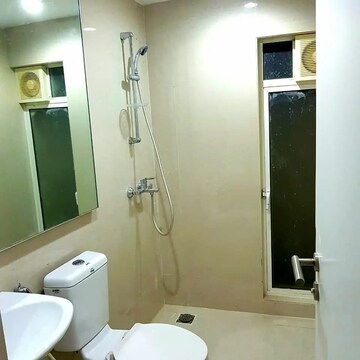Bathroom in 1 BHK Apartment at Puranik City, Kasarvadavali – for Rent