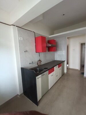 Kitchen in 1 BHK Apartment at Puranik Hometown, Ghodbunder Road – for Sale
