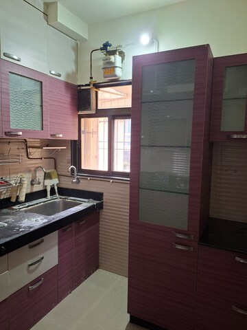 Kitchen in 2 BHK Apartment at Cosmos Jewels, Ghodbunder Road – for Rent