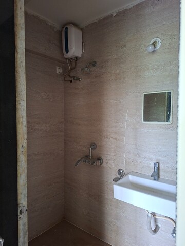 Bathroom in 2 BHK Apartment at Cosmos Jewels, Ghodbunder Road – for Rent