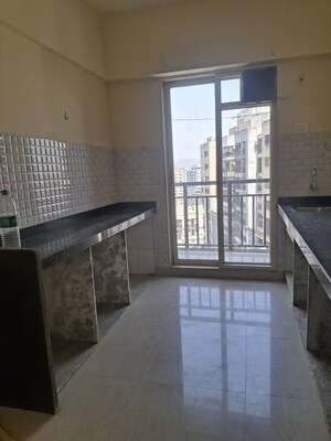 Kitchen in 2 BHK Apartment at Vihang Valley Phase 3, Kasarvadavali – for Sale