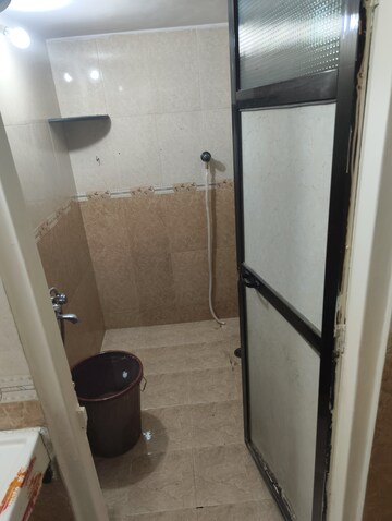 Bathroom in 1 BHK Apartment at Raj Corp Rameshwaram Apartment, Dahisar East – for Rent