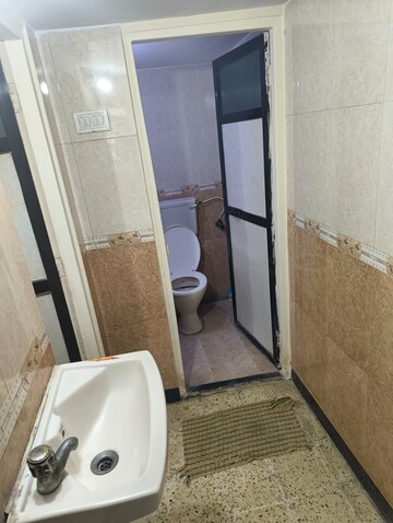 Bathroom in 1 BHK Apartment at Raj Corp Rameshwaram Apartment, Dahisar East – for Rent