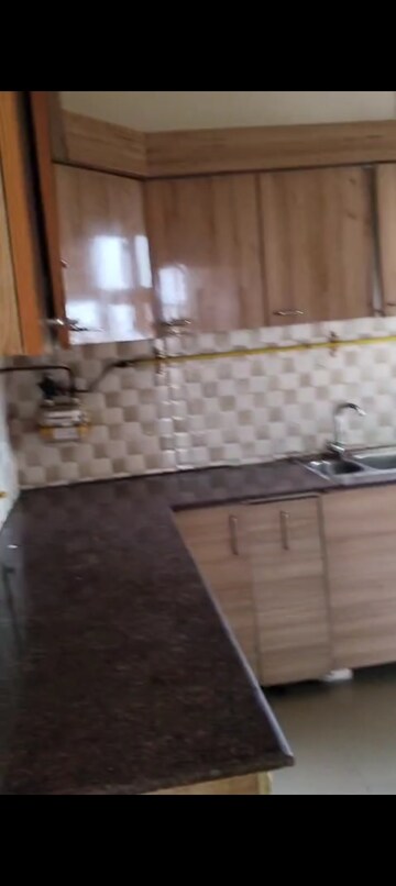Kitchen in 2 BHK Apartment at Panchsheel Greens, Sector 16 Greater Noida – for Rent