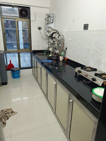 Kitchen in 2 BHK Apartment at Shiv Shakti Tower 28, Malad East – for Rent