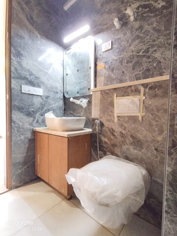 Bathroom in 3.5 BHK Apartment at Emaar The Palm Drive-Palm Studios, Sector 66 – for Rent