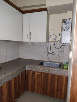 Kitchen in 2 BHK Builder Floor at Happy Home Noida, Sector 73 – for Sale