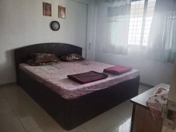 Bedroom in 2 BHK Apartment at Karan Athena, Wadgaon Sheri – for Rent
