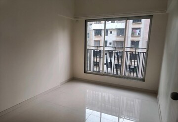 Room in 2 BHK Apartment at Bini Winspace Amelio, Andheri West – for Rent