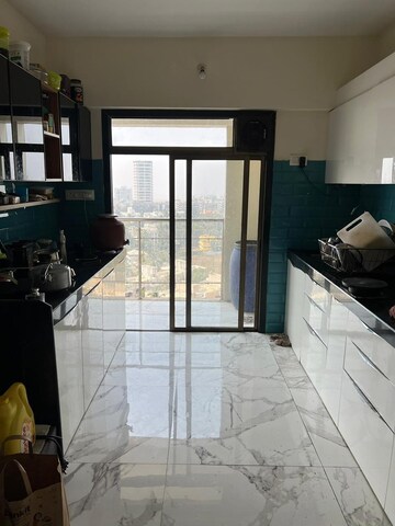 Kitchen in 3 BHK Apartment at Dn Nagar – for Rent