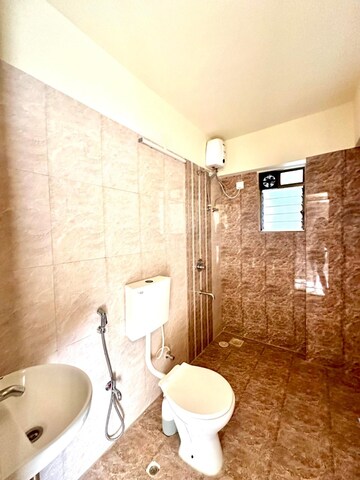 Bathroom in 3 BHK Apartment at Anmol Eleganzia Royale, Andheri West – for Rent