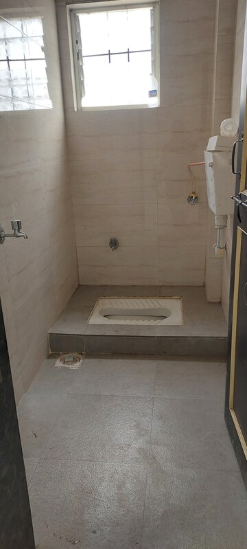 Bathroom in 1 BHK Apartment at Gurudatta CHS, Dhankawadi – for Rent